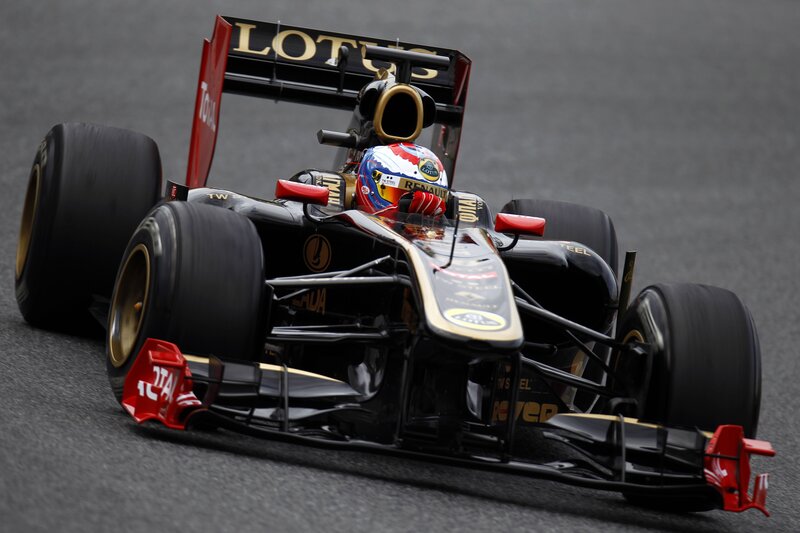 Formula One Car on Track — Black, Dynamic, Photograph, Driver, Helmet