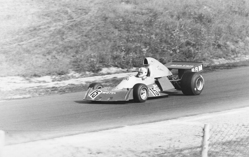 Formula One Car on Track — Black, Dynamic, Photograph, Driver, Race Car, Gravel