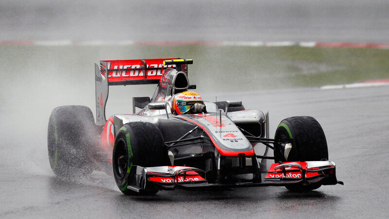Formula One Car on Track — Black, Dynamic, Photograph, Driver, Rain
