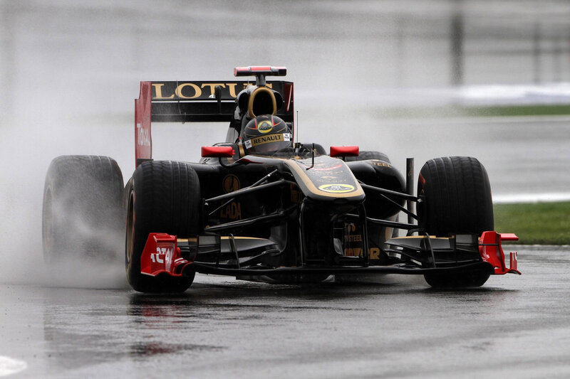 Formula One Car on Track — Black, Dynamic, Photograph, Driver
