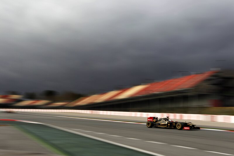 Formula One Car on Track — Black, Dynamic, Photograph, Race Car