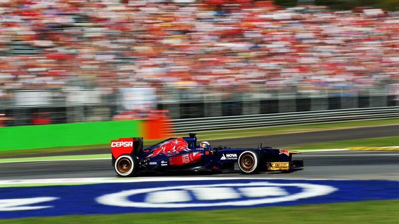 Formula One Car on Track — Blue, Dynamic, Afternoon, Photograph, Crowd