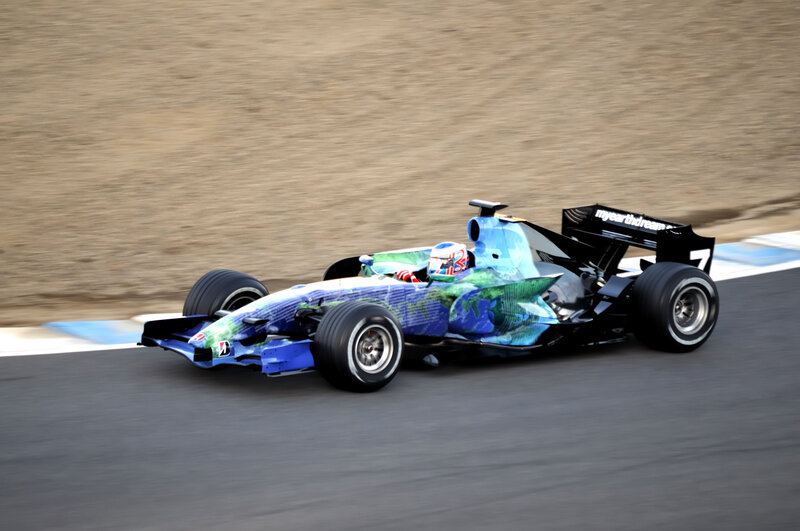 Formula One Car on Track — Blue, Dynamic, Afternoon, Photograph, Driver, Race Car, Black