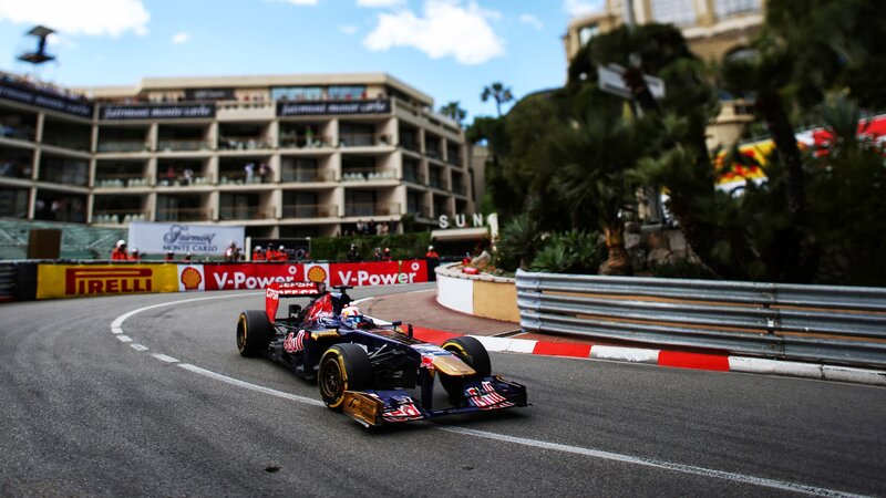 Formula One Car on Track — Blue, Dynamic, Afternoon, Photograph, Race Car, Building