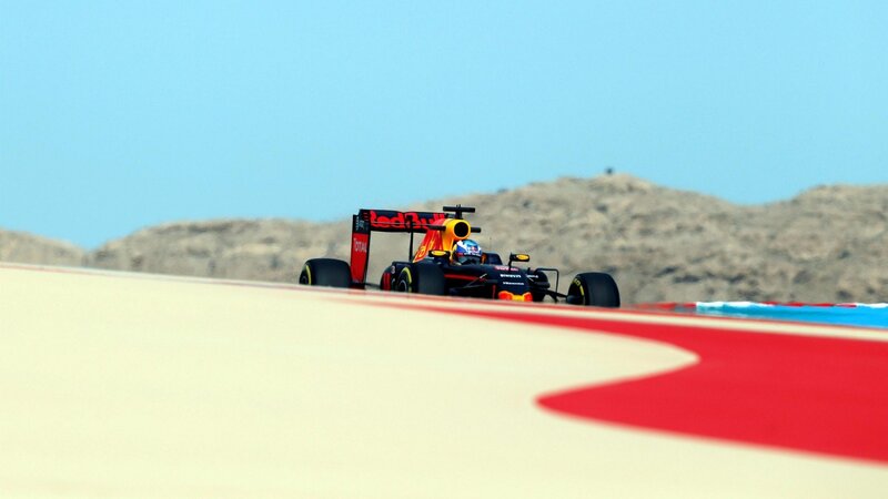 Formula One Car on Track — Blue, Dynamic, Afternoon, Photograph, Racing Car, Driver, Desert