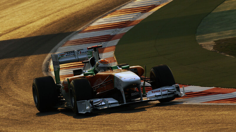 Formula One Car on Track — Brown