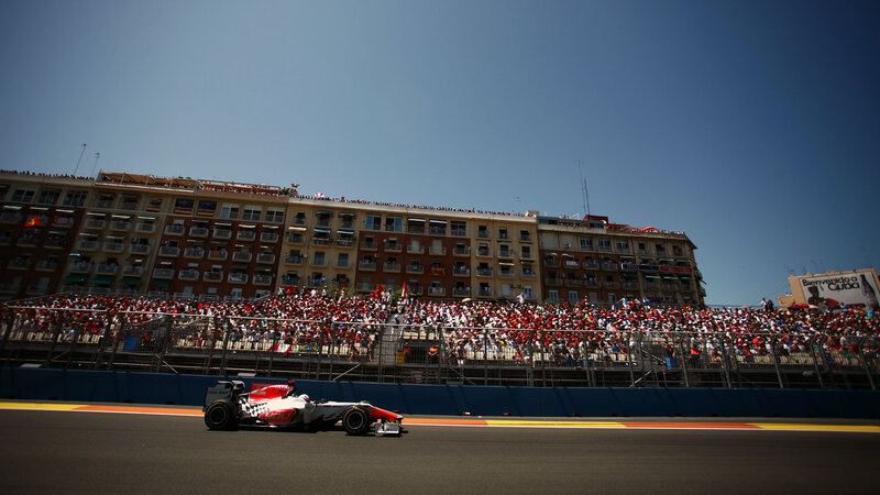 Formula One Car on Track — Gray, Active, Afternoon