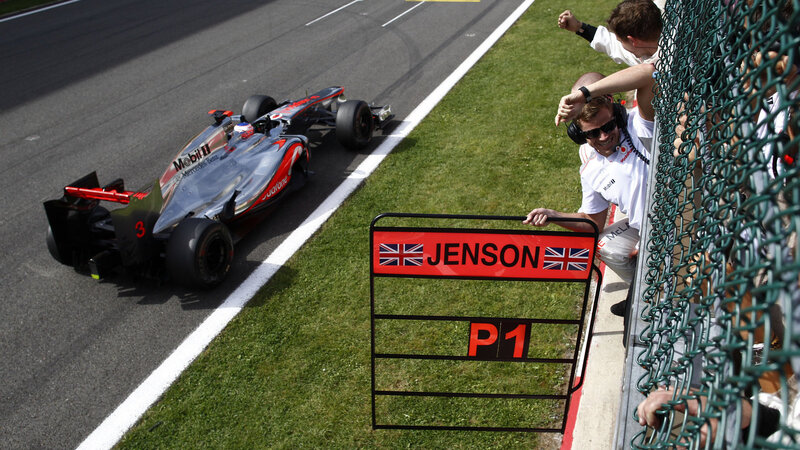 Formula One Car on Track — Gray, Competitive, Afternoon