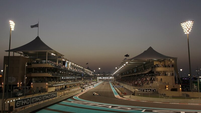 Formula One Car on Track — Gray, Dramatic, Night, Photograph