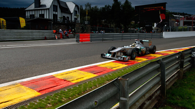 Formula One Car on Track — Gray, Dramatic, Night