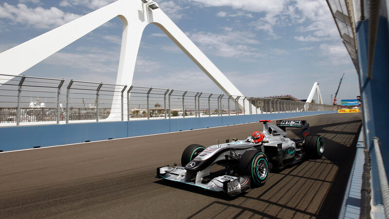 Formula One Car on Track — Gray, Dynamic, Afternoon, Photograph, Bridge