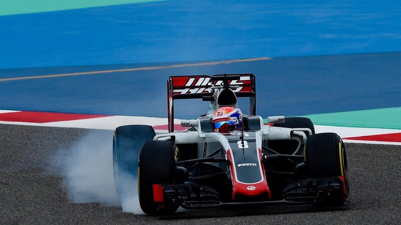 Formula One Car on Track — Gray, Dynamic, Afternoon, Photograph, Driver, Smoke