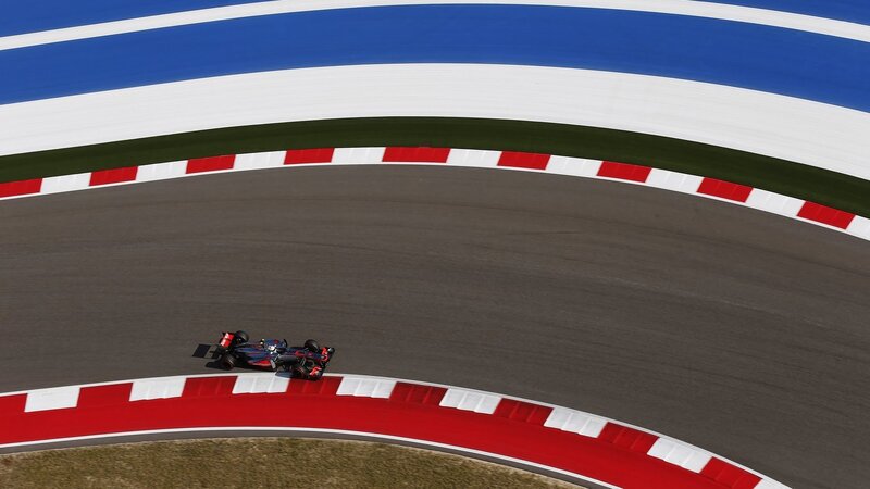 Formula One Car on Track — Gray, Dynamic, Afternoon, Photograph, Race Car, Curved Corner