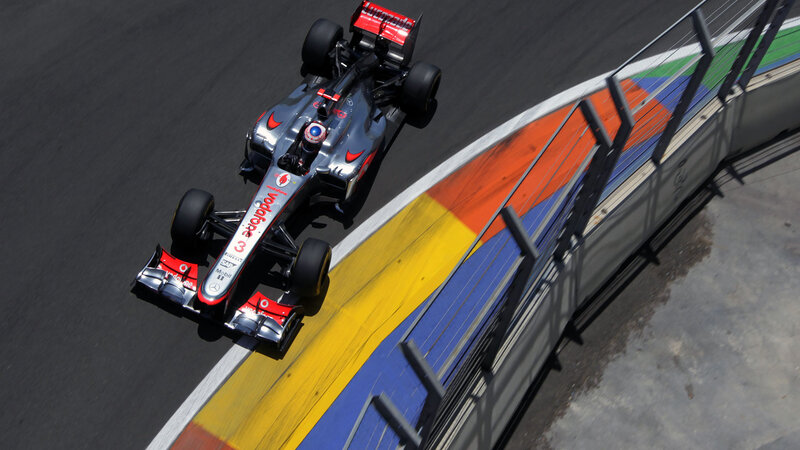 Formula One Car on Track — Gray, Dynamic, Afternoon, Photograph, Racing Car, Guardrail
