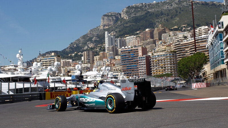 Formula One Car on Track — Gray, Dynamic, Afternoon, Photograph, Yachts