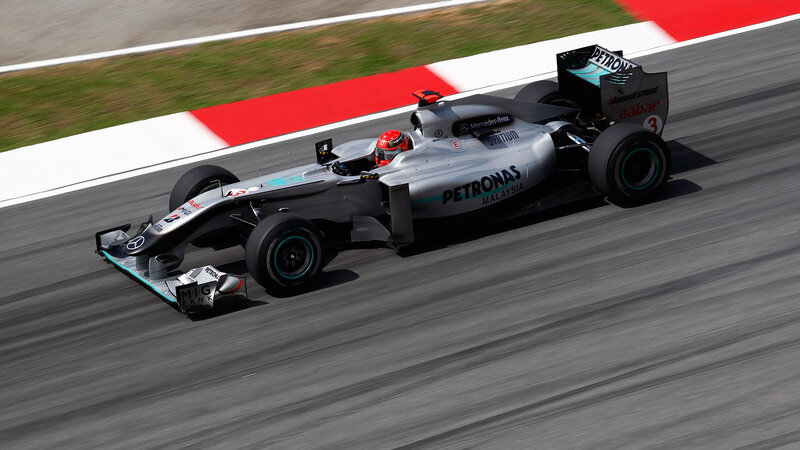 Formula One Car on Track — Gray, Dynamic, Afternoon