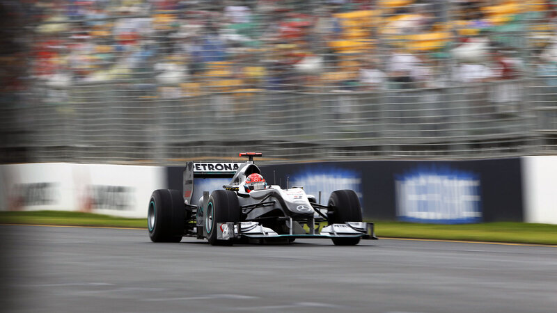 Formula One Car on Track — Gray, Dynamic, Photograph