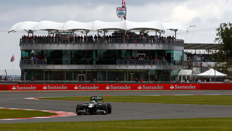 Formula One Car on Track — Green, Active, Afternoon, Photograph