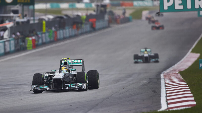 Formula One Car on Track — Green, Competitive