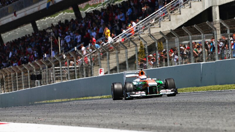Formula One Car on Track — Green, Dynamic, Afternoon, Photograph