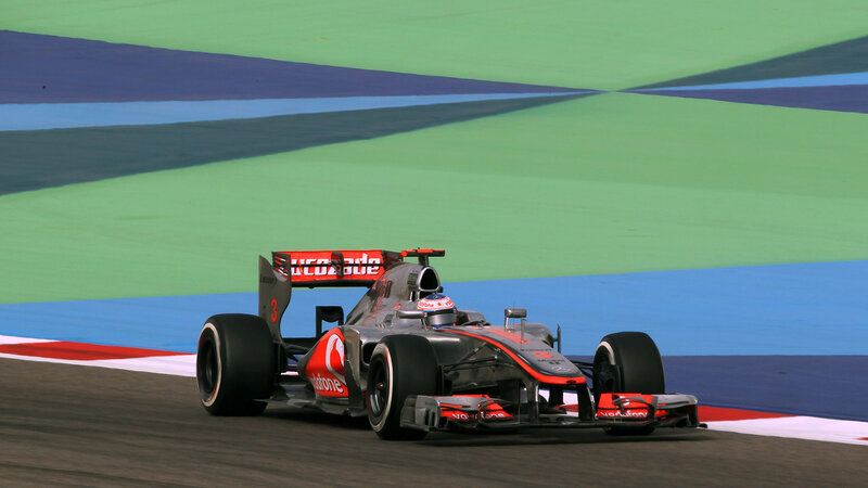 Formula One Car on Track — Green, Dynamic, Photograph, Driver