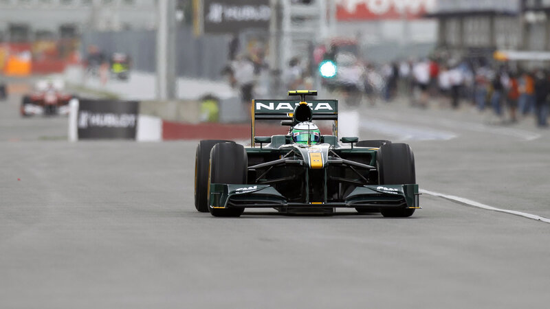 Formula One Car on Track — Green, Focused