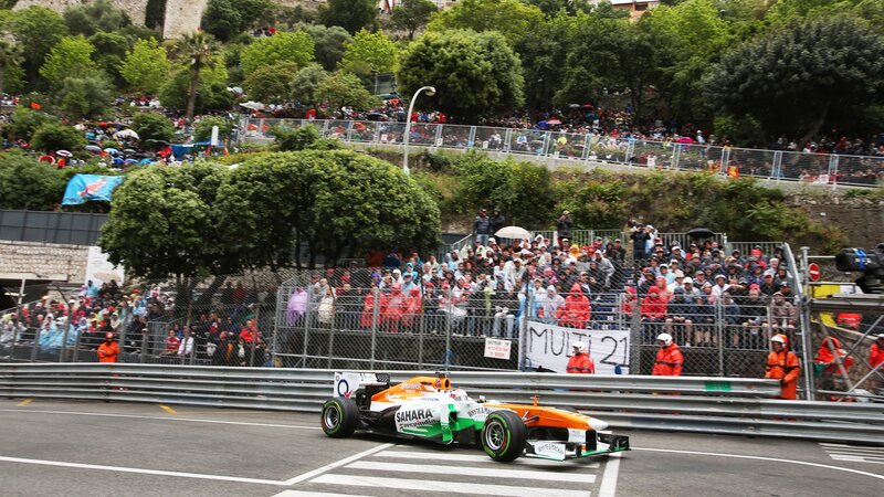 Formula One Car on Track — Orange, Active, Afternoon, Photograph