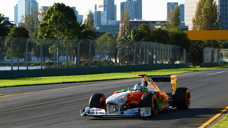 Formula One Car on Track — Orange, Active