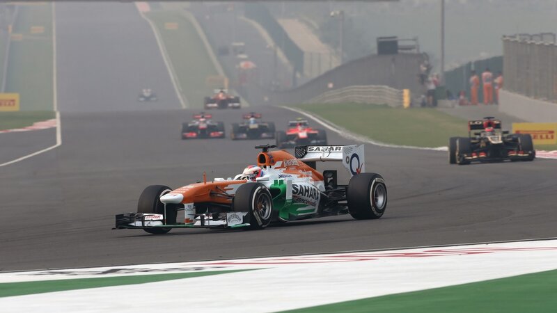 Formula One Car on Track — Orange, Competitive, Afternoon, Photograph