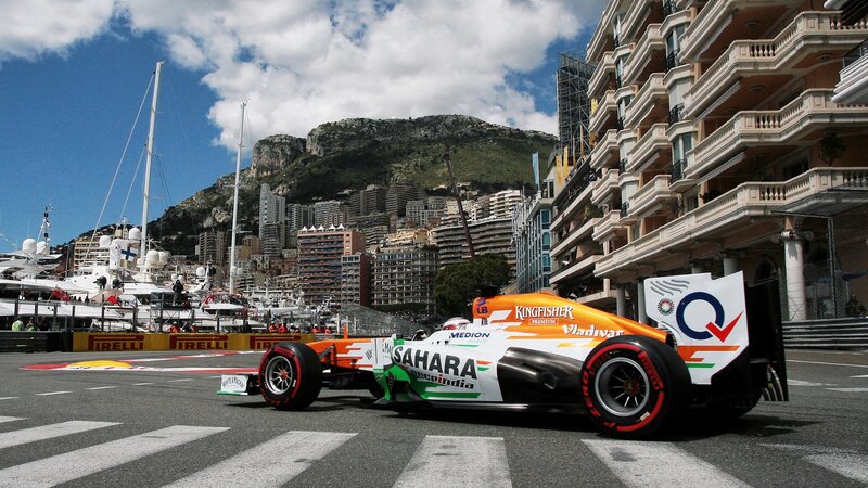 Formula One Car on Track — Orange, Dramatic, Afternoon