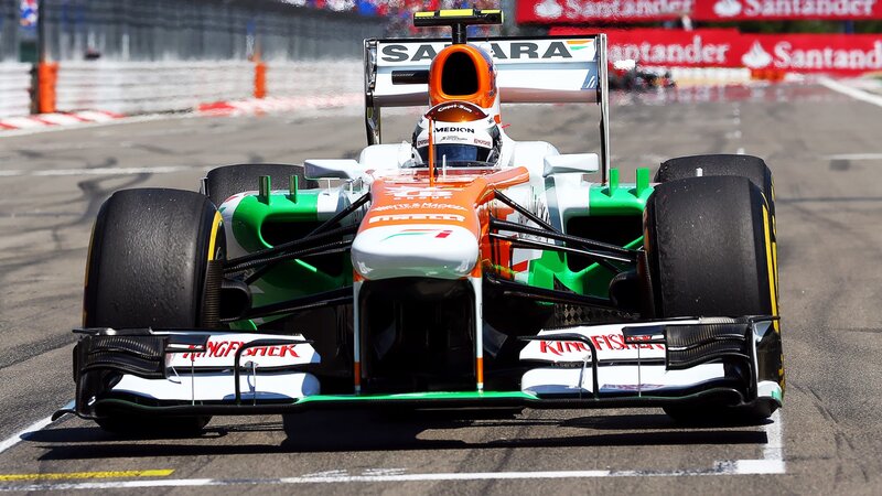 Formula One Car on Track — Orange, Dynamic, Afternoon, Photograph, Driver, Race Car, Santander