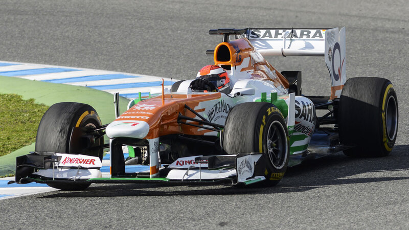 Formula One Car on Track — Orange, Dynamic, Afternoon, Photograph, Driver, Racing Tire