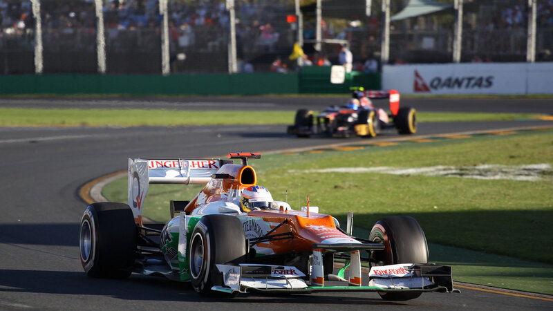 Formula One Car on Track — Orange, Dynamic, Afternoon, Photograph