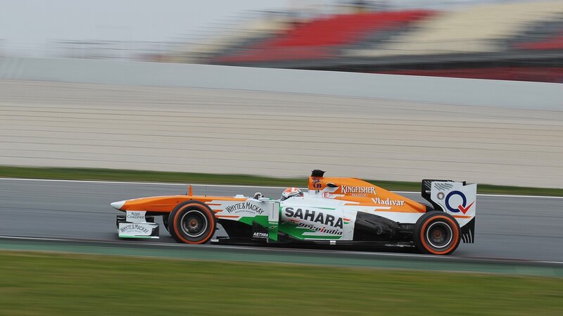 Formula One Car on Track — Orange, Dynamic, Photograph, Driver, Race Track