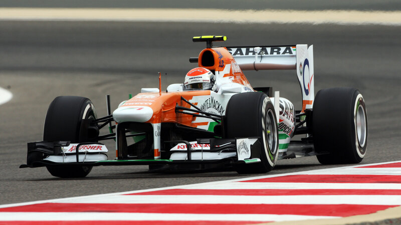 Formula One Car on Track — Orange, Dynamic, Photograph, Driver, Racing Car