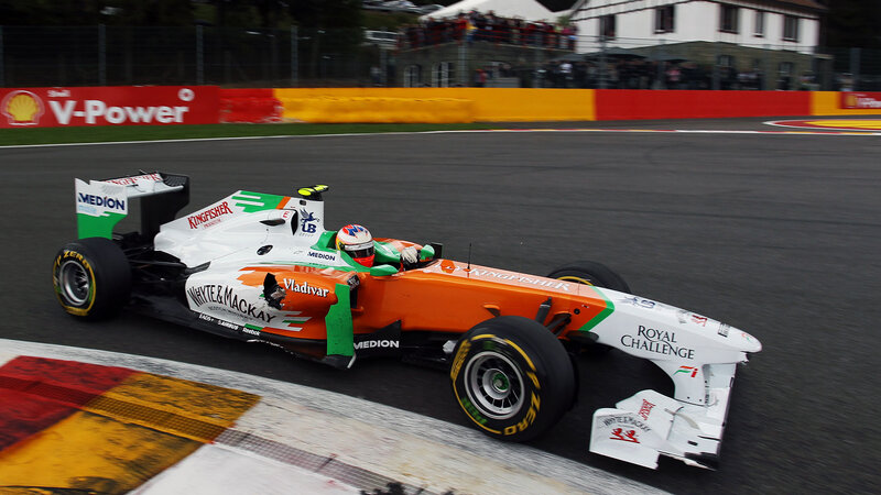 Formula One Car on Track — Orange, Dynamic, Photograph, Driver