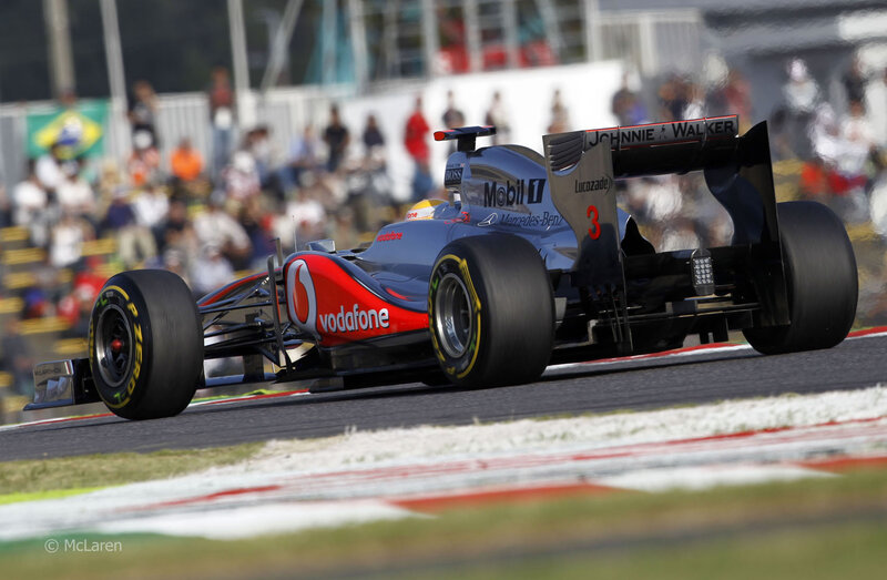 Formula One Car on Track — Red, Dynamic, Afternoon, Photograph, Crowd, Race Car, Blue