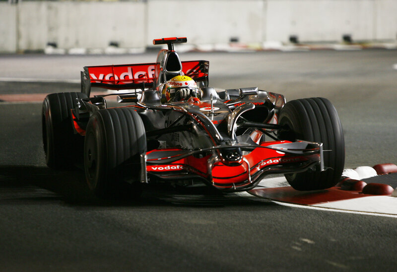 Formula One Car on Track — Red, Dynamic, Night, Photograph, Driver
