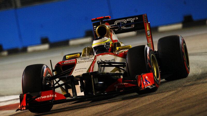 Formula One Car on Track — Red, Dynamic, Night, Photograph