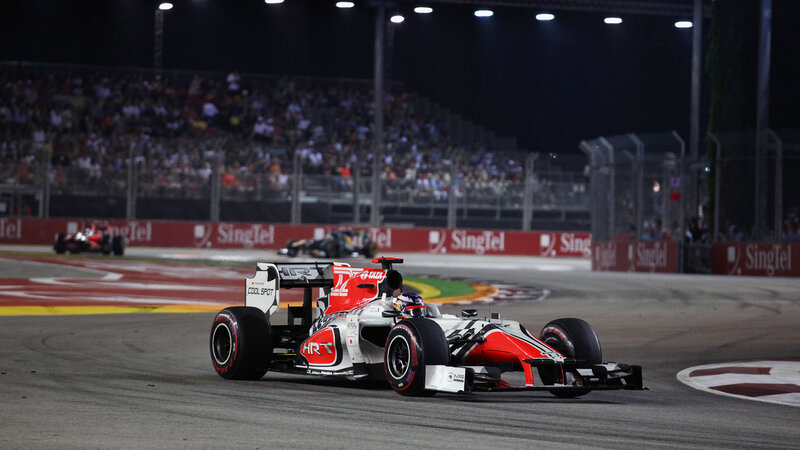 Formula One Car on Track — Red, Dynamic, Night