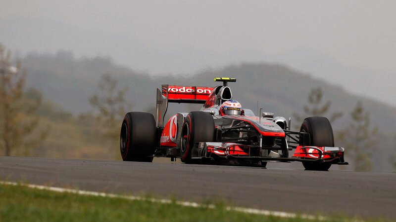 Formula One Car on Track — Red, Dynamic, Photograph, Driver, Mountains