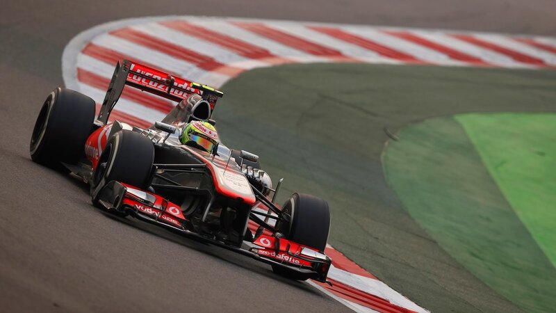 Formula One Car on Track — Red, Dynamic, Photograph, Driver, Racetrack