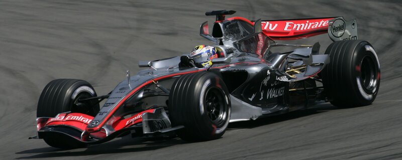 Formula One Car on Track — Silver, Afternoon