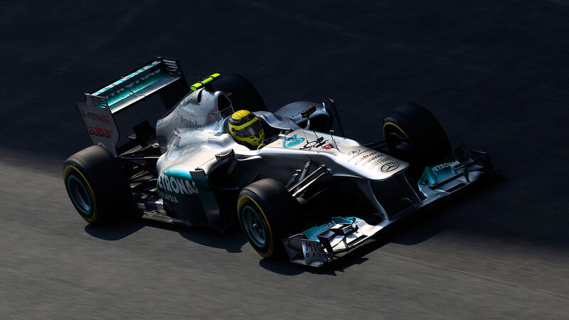 Formula One Car on Track — Silver, Dramatic, Afternoon