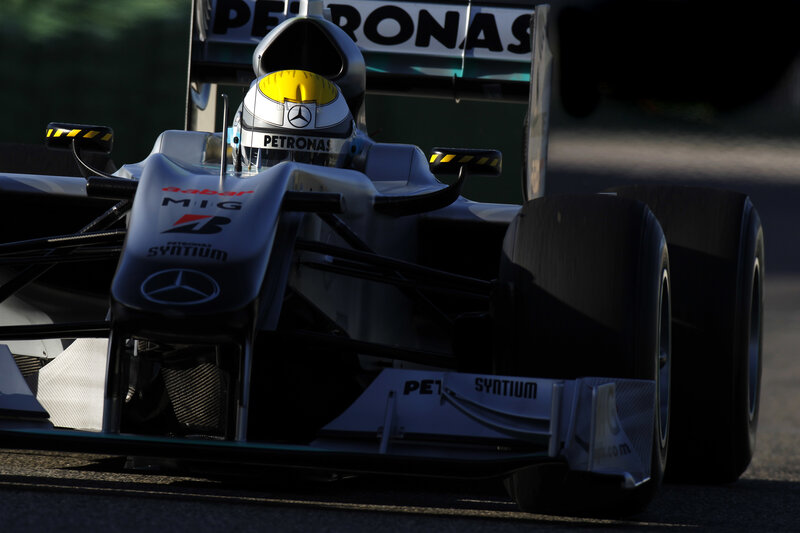 Formula One Car on Track — Silver, Dramatic