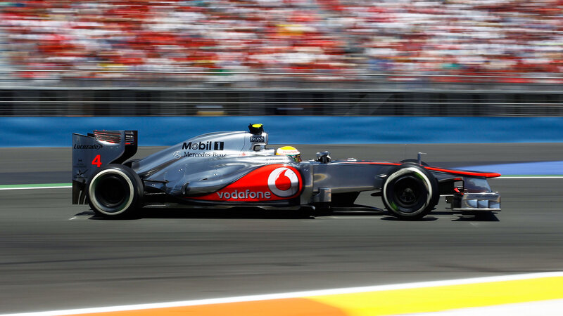 Formula One Car on Track — Silver, Dynamic, Afternoon, Photograph, Driver, Crowd