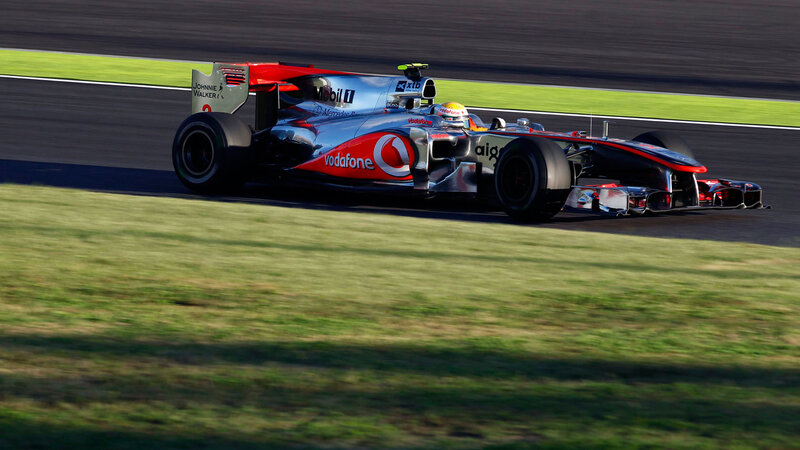 Formula One Car on Track — Silver, Dynamic, Afternoon, Photograph, Driver, Grass