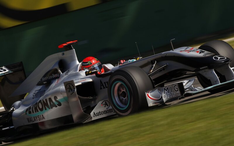 Formula One Car on Track — Silver, Dynamic, Afternoon, Photograph, Driver, Grass, Wall