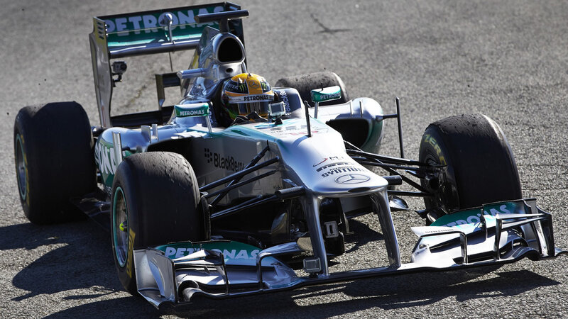 Formula One Car on Track — Silver, Dynamic, Afternoon, Photograph, Driver, Racing Car, Tires
