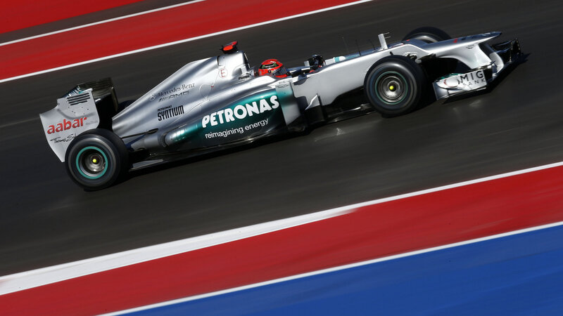 Formula One Car on Track — Silver, Dynamic, Afternoon, Photograph, Driver, Racing Circuit, Safety Barrier